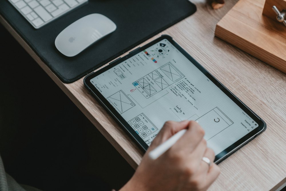 App wireframes on a tablet
